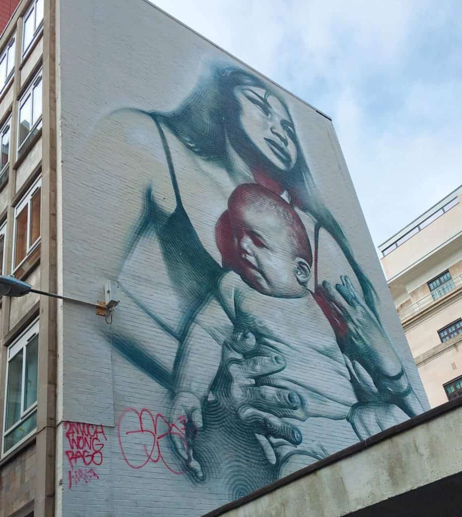 woman and baby street art bristol